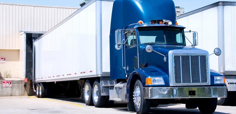 white and blue semi truck 